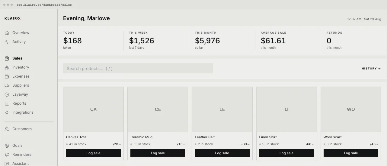 The Sales screen: today's revenue, this week and this month, and the product tile grid with live stock counts.